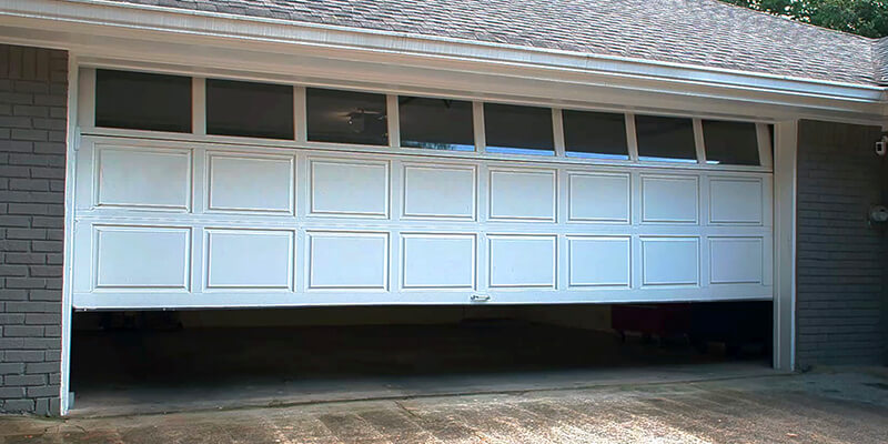 Why Does My Garage Door Keep Opening - Johnsons Mobile Garage Door